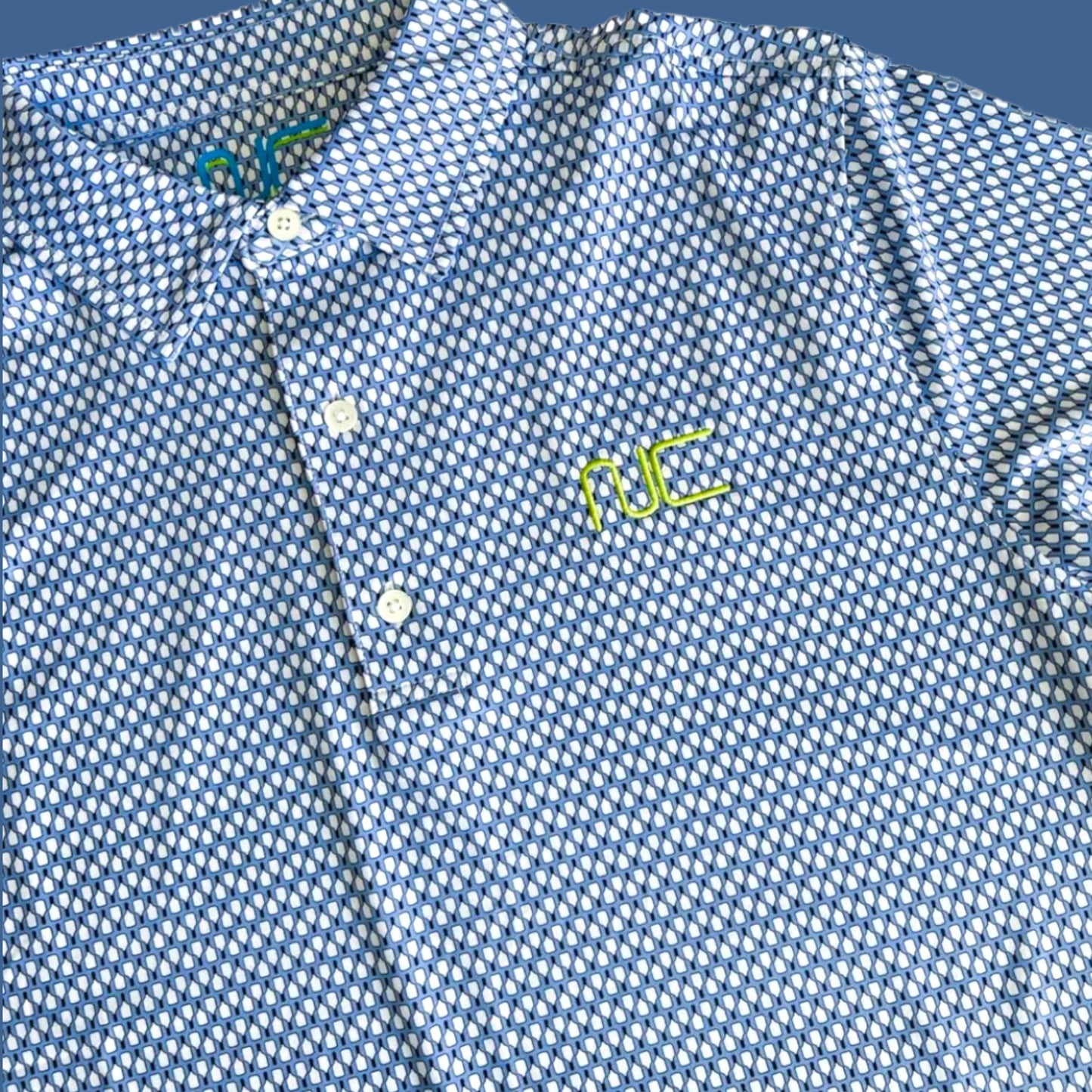IN STORE ONLY! Performance Polo | blue + paddle pattern